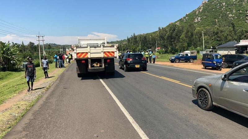 NTSA and NPS officers inspecting vehicles.